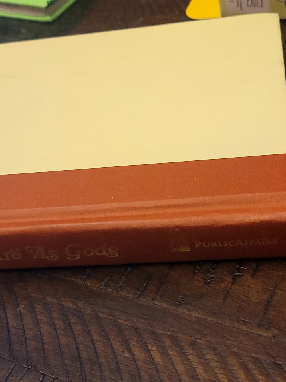 Hardcover Book with Cream Cover and Orange Spine